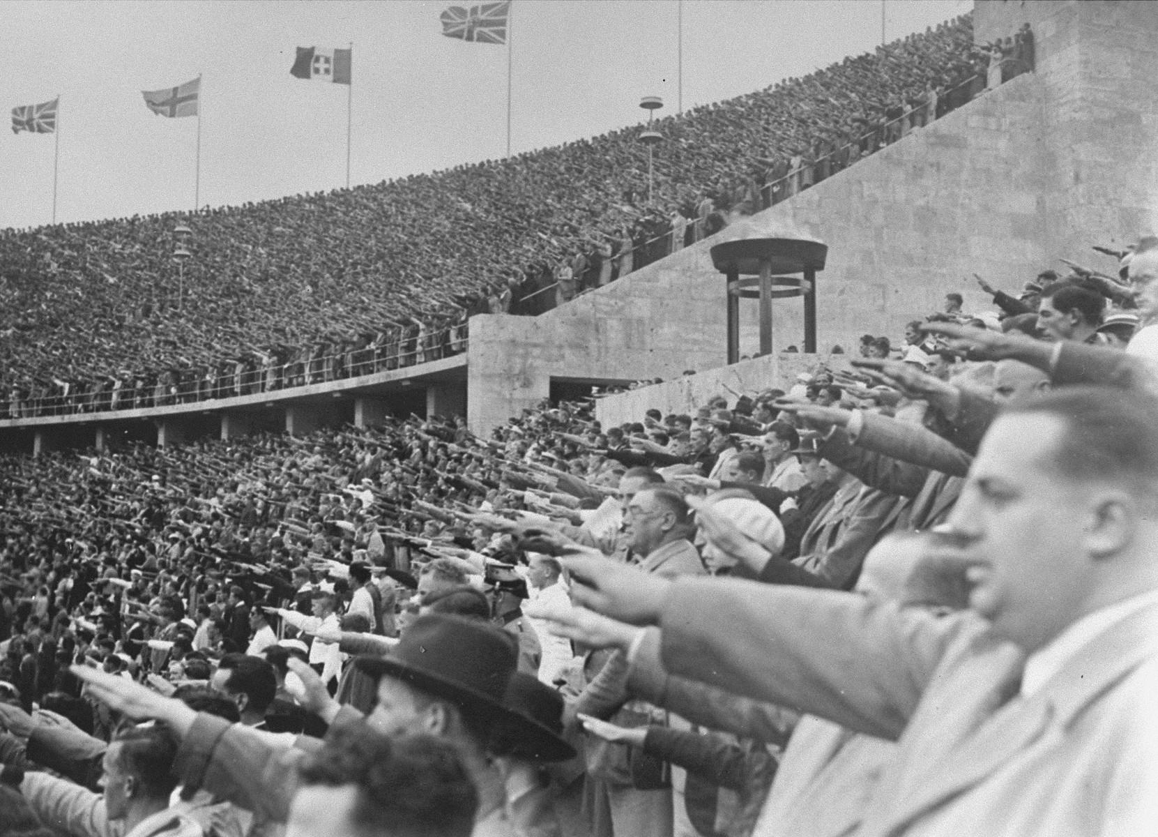 German citizens giving the ‘Heil’ salute to Adolf Hitler at the opening of the 11th Olympiad in Berlin, 1936. (1661×1200)