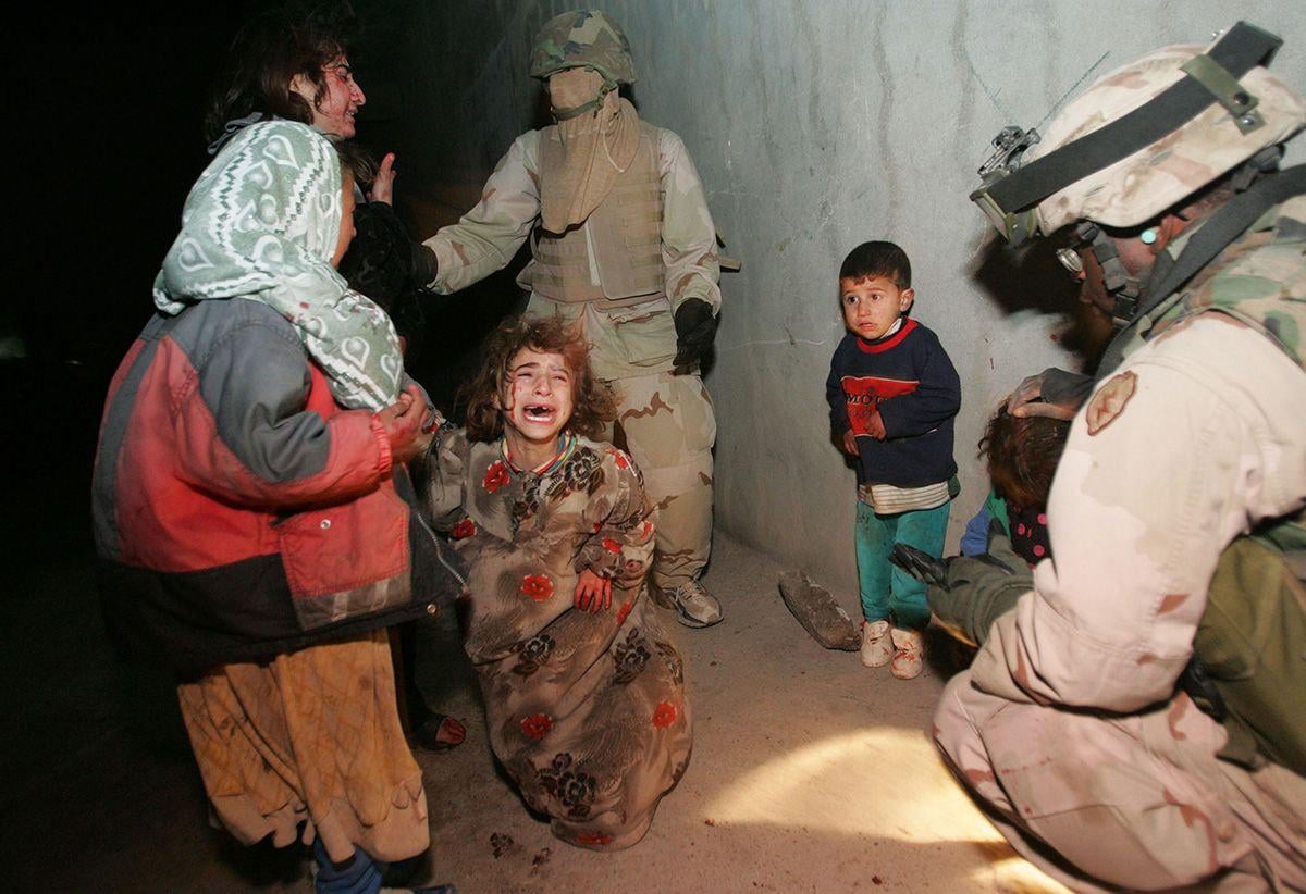 Children cry after their parents were killed when U.S. soldiers with the 1st Battalion fired on their car when it failed to stop and came toward soldiers despite warning shots during a dusk patrol in Tal Afar, Iraq, 2005[1200×822]