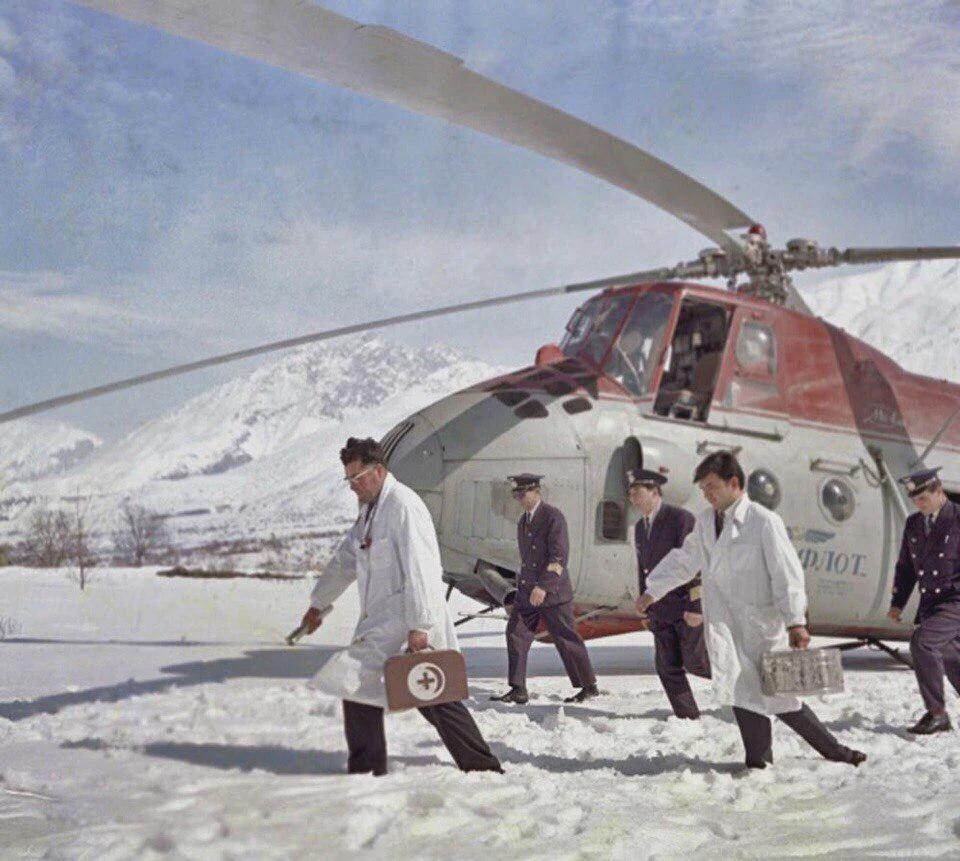 Doctors arrive by Mil Mi-4 air ambulance to visit a patient in a remote mountain village, USSR, 1970s. [960×861]