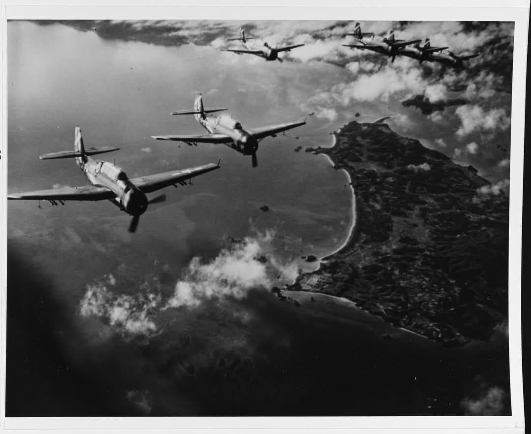 Six USS Hancock (CV-19) TBM bombers fly near Okinawa, while supporting the invasion forces, 4 April 1945. [1080×883]