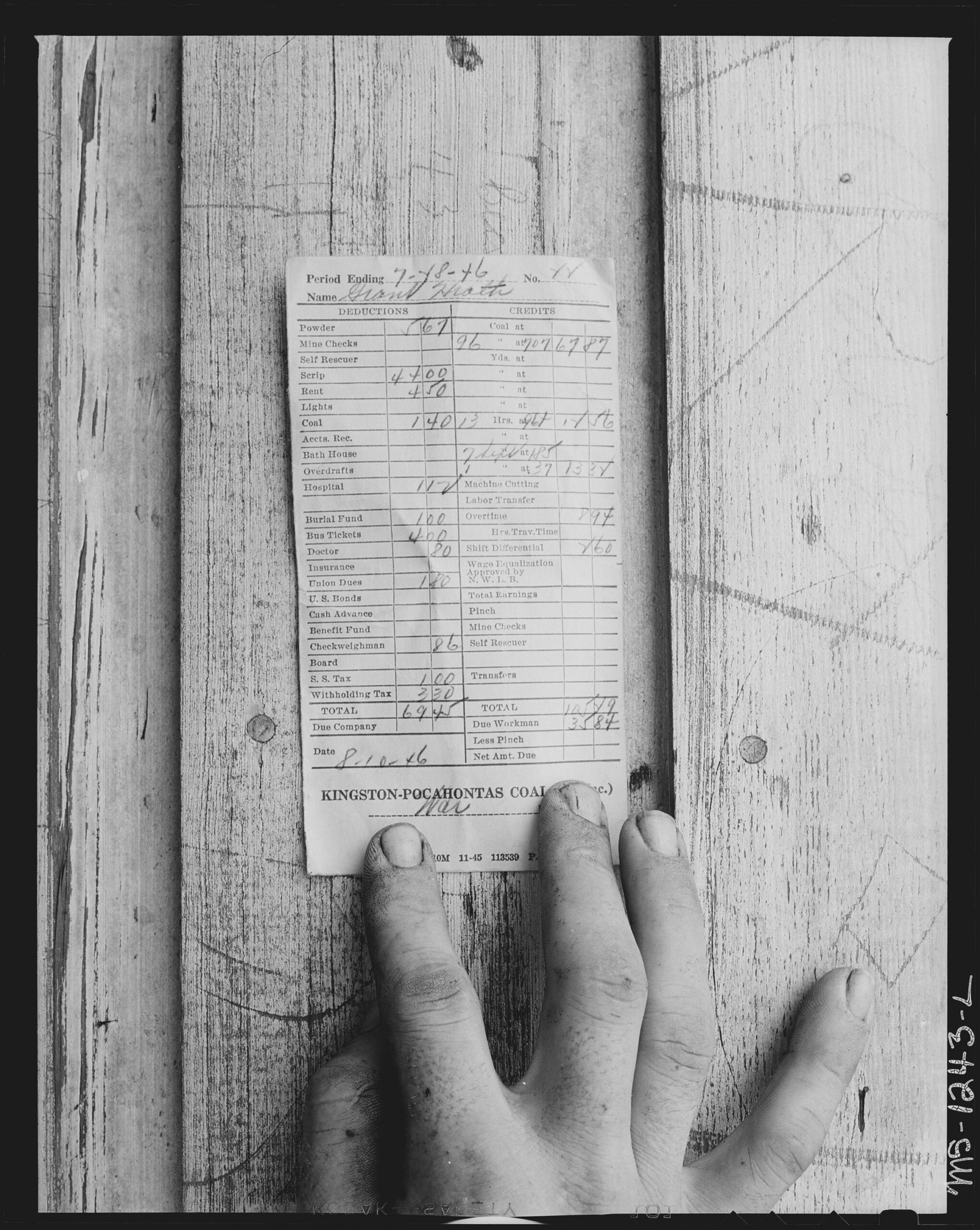 Pay slip for a half month period in Kingston Pocahontas Coal Company, Exeter Mine, Big Sandy Housing Camp, Welch, McDowell County, West Virginia 1946.[2391×3000]