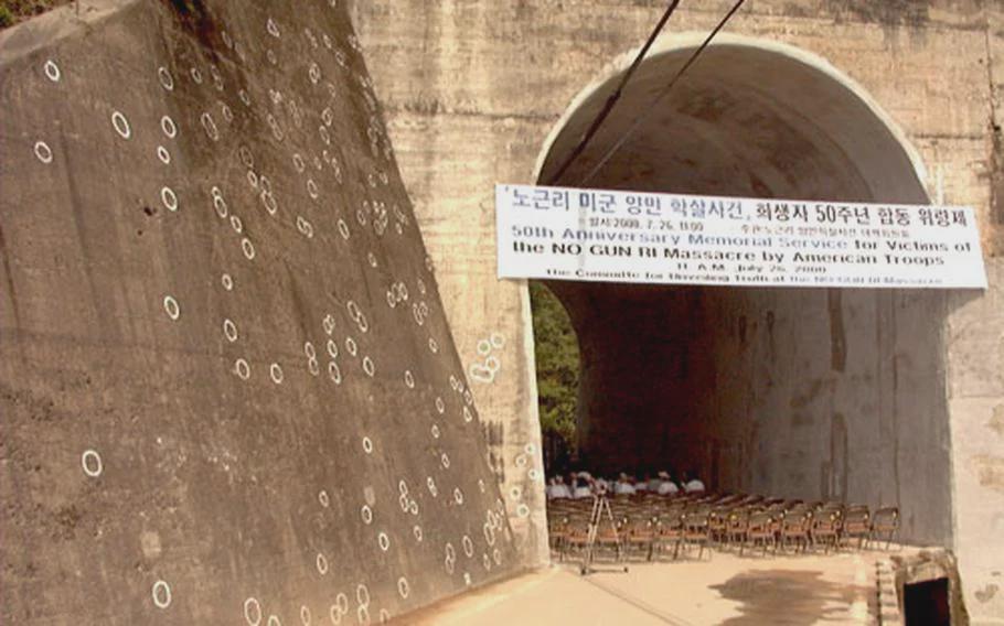 From July 26-29, 1950, U.S soldiers in Korea murdered up to 250-300 war refugees, including women and children. Bullet holes are still visible and marked at the tunnel bridge where most people died, 50th Anniversary Memorial Service, 2000. [910×568]