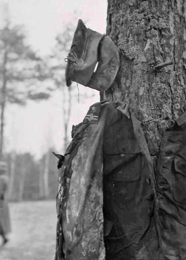 Uniform of Polish officer, victim of Katyń Massacre, found during German exhumation. Katyń, German-occupied Russia, 1943. [633×884]
