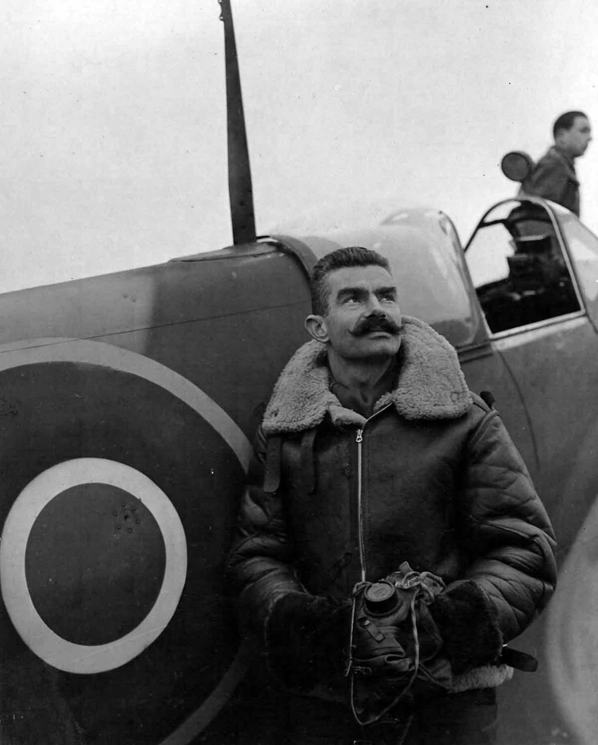 Free French RAF pilot Raymond Boillot posing with his Spitifire, 1942 (1200×1400)