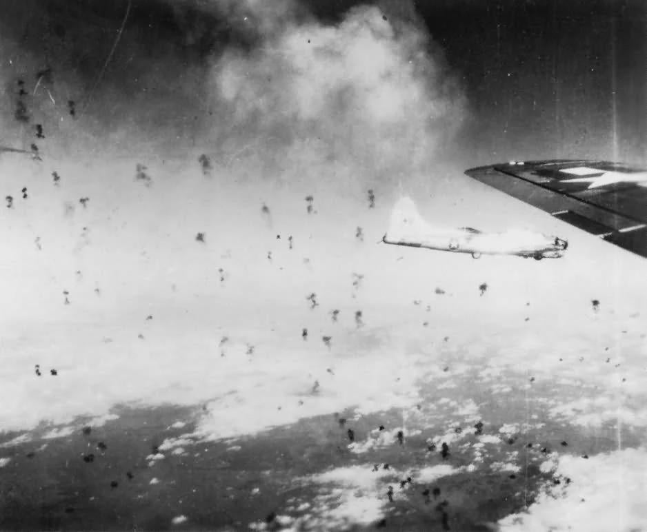 B-17 Flying Fortresses of the 490th Bomb Group, 8th Air Force flying through heavy flak, 1944. [938×772]