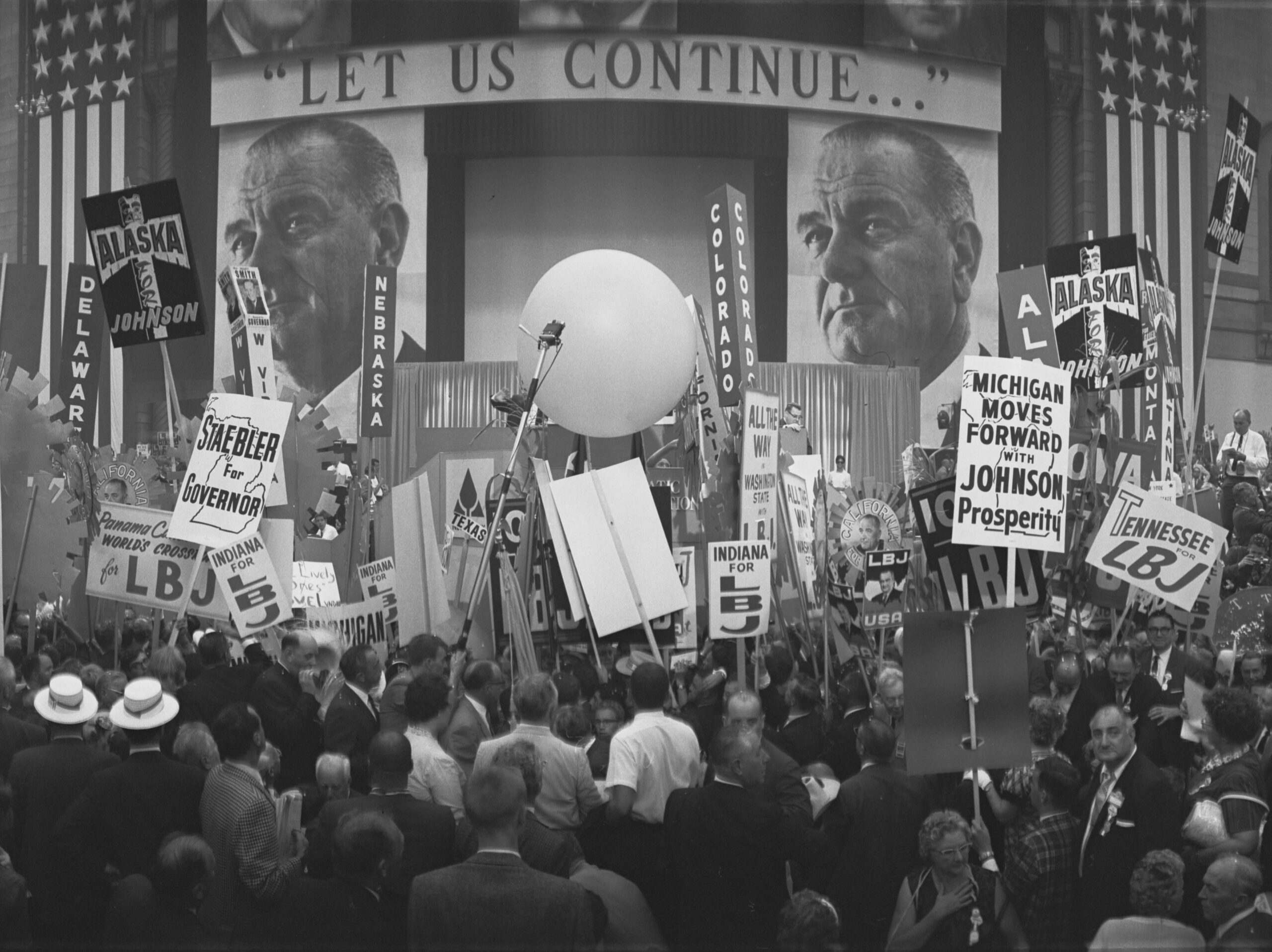 Crowd members at the 1964 Democratic National Convention holding up signs in support of President Lyndon B. Johnson. (1964) [4006×3000]