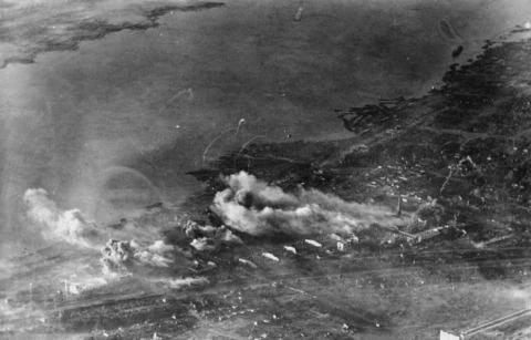 Image from German State Archive with clouds of smoke and dust rise from the ruins of Stalingrad after German bombing of the city on 2 October 1942. [480×307]