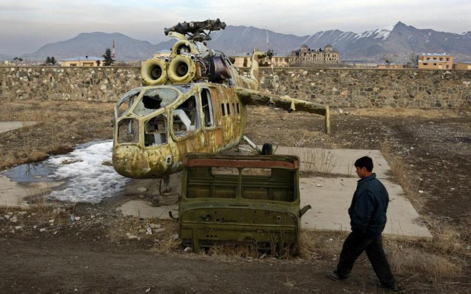 The wreck of a dismantled Russian Mi-24A ‘Hind’ helicopter gunship, formerly belonging to the Afghan Air – in Kabul, Afghanistan, c. early 2000s. [960 x 600]