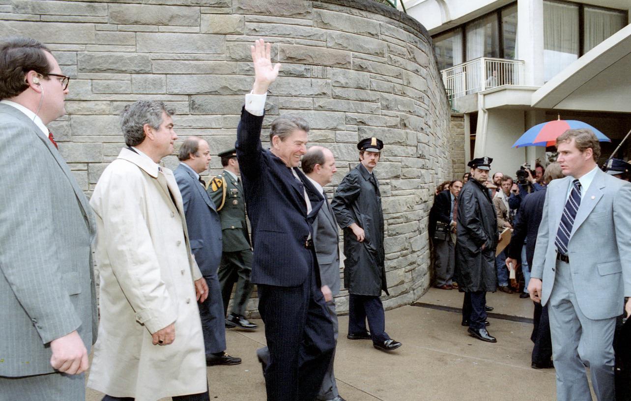 President Ronald Reagan waves to the crowd moments before the assassination attempt, March 30th, 1981 [1284X816].