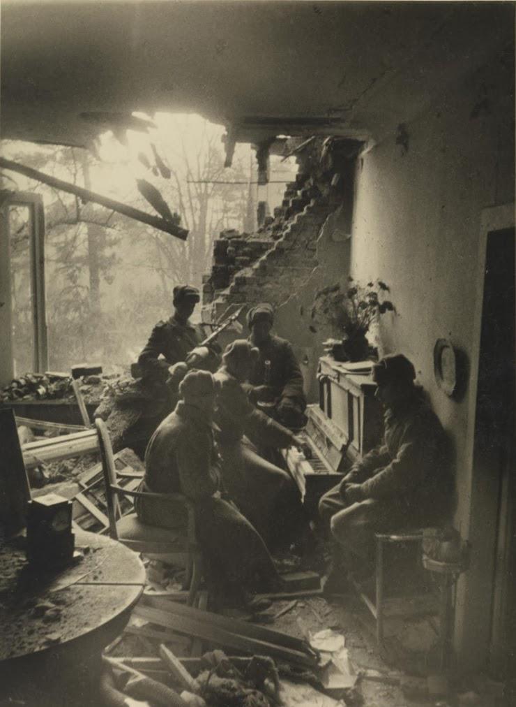 Russian soldiers playing a piano in a ruined house (Berlin, Germany – c. May 1945) [740×1012]