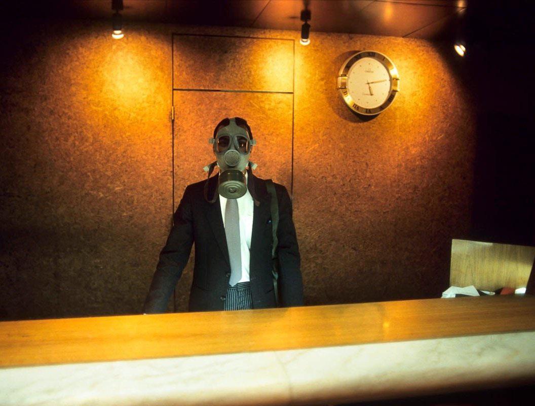 A hotel receptionist during a Scud missile alert at the Le Méridien, during the 1st gulf war. Dhahran. Saudi Arabia, January 1991. [1056 x 800]