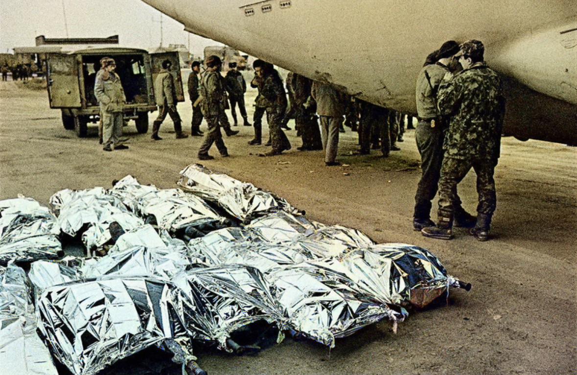 Bodies of dead Soviet soldiers who were killed in Afghanistan being prepared to get flown back to the USSR, 1986. (1179×767)