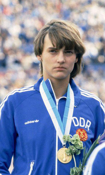 East German athlete Heike Drechsler – on the podium with her gold medal, for the women’s long jump at the World Athletics Championships in Helsinki, Finland, c. August 7th – 14th, 1983. [368 x 614]