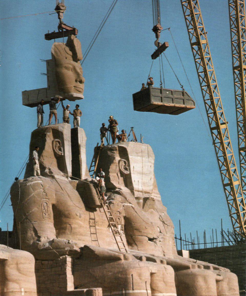 Workers reassemble the statue of Ramses the Great at the Temple of Abu Simbel in 1967. The entire complex was relocated 200 meters further inland to allow for construction of the Aswan High Dam. [960 x 1155]