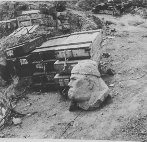 A stone carving of Mussolini found near a captured Italian ammunition dump by the British, at a former Italian-held fort, 1941. [471×452]