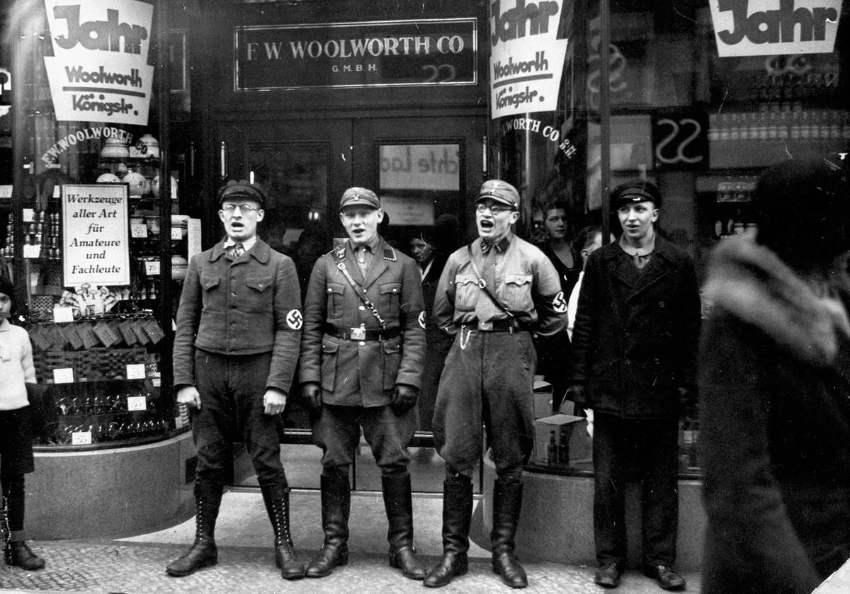 Nazi troops singing in front of Woolworth Co during the movement to boycott Jewish presence in Germany. Hitlerites believed the founder of Woolworth Co was Jewish. (1933) [1200×839]