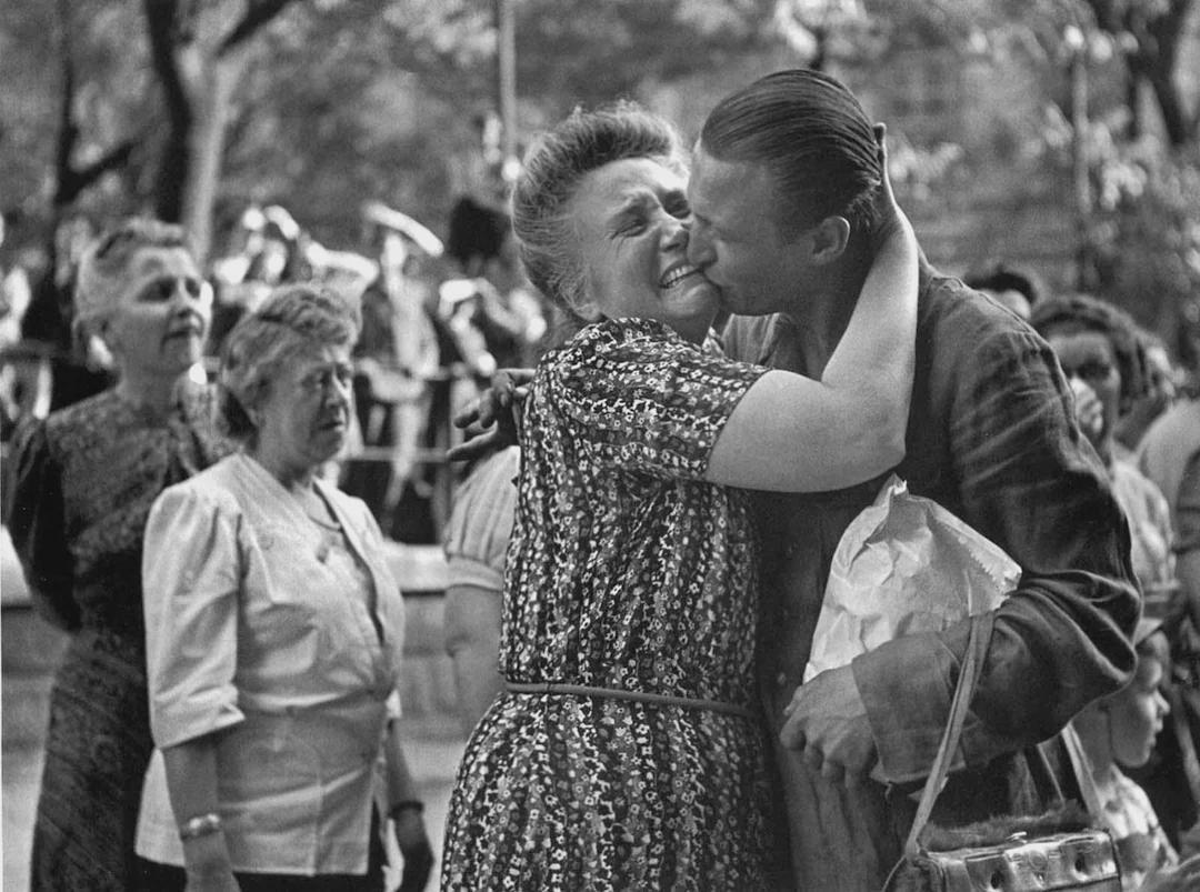 A woman greets her son, an Austrian prisoner of war returning home to Vienna, 1947. [1600×1191]