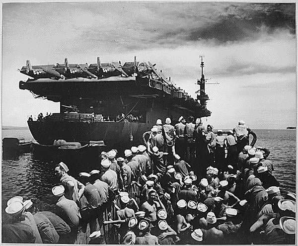 “Liberty party”- Liberty section personnel aboard LCM returning to USS CASABLANCA from Rara Island, off Pitylieu Island, Manus. April 19, 1945. [600×495]
