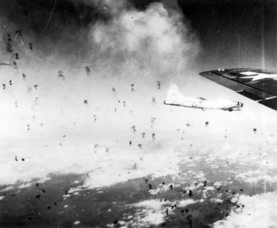 B-17 Flying Fortresses of the 490th Bomb Group, 8th Air Force flying through heavy flak, 1944 [938×772]