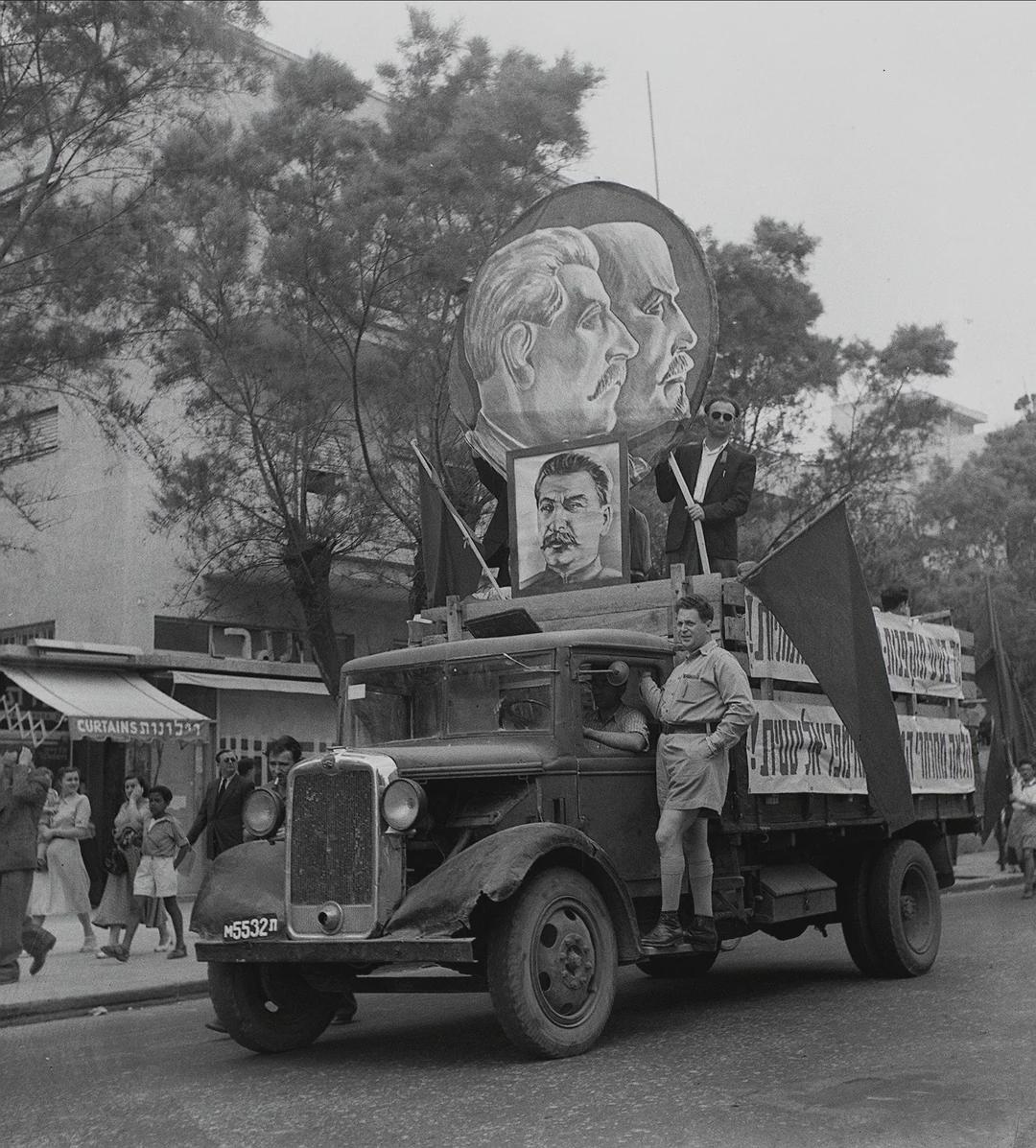 Portraits of Lenin and Stalin mounted on a truck during a Labour day parade. Tel Aviv, Israel, 1949. [1080×1197]