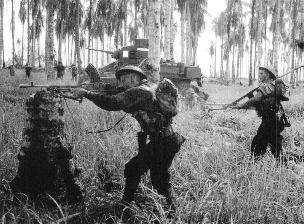 Australian troops assaulting a Japanese pillbox with support from an M3 Stuart, Giropa Point, Papua New Guinea, 1943 [1,248 × 919]