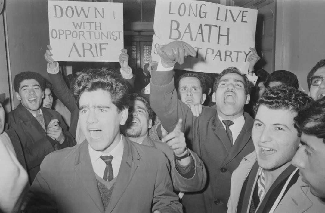 Iraqi students protesting and pledging their allegiance to the Ba’ath Party, Iraq, 1963. [1080×708]
