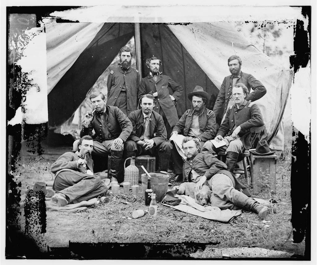 William G. Jones seated in a chair (far right), Nicolas Bowen laying on the ground (left) and George A. Custer laying on the ground (right). Photograph by James F. Gibson during the Peninsular Campaign, May 1862. [1024×856]