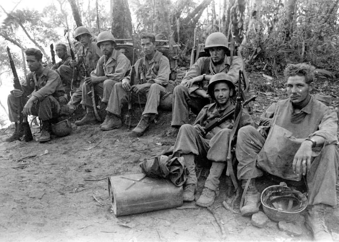 GIs with the 33rd Infantry Division take a break in the Caraballo Mountains, Philippines – April 1945. [1080×771]