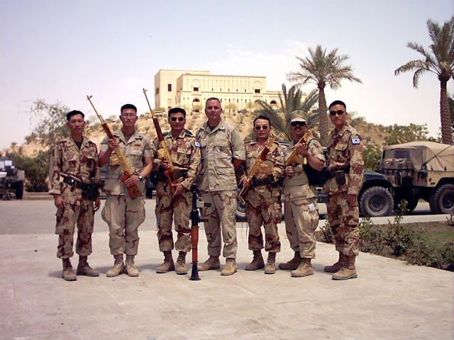 U.S. and South Korean soldiers holding gold-plated SVD and AKS rifles captured in Iraq in 2004 [640 x 480]