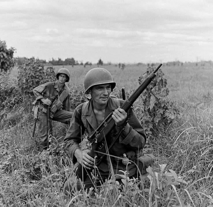 A U.S. Army Sniper with a M1903A4 Springfield sniper rifle in the Philippines near Capas, Tarlac, 1945. [738×720]