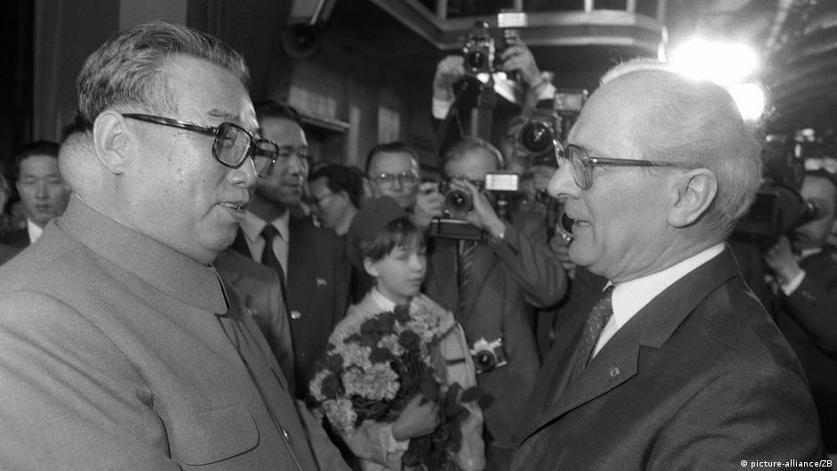Supreme leader of north korea Kim il sung in East Germany meeting honecker 1980s, this is another one of the few rare images that shows the giant calcium deposit that grew on the back of his head which photographers where never allowed to capture (940×529)