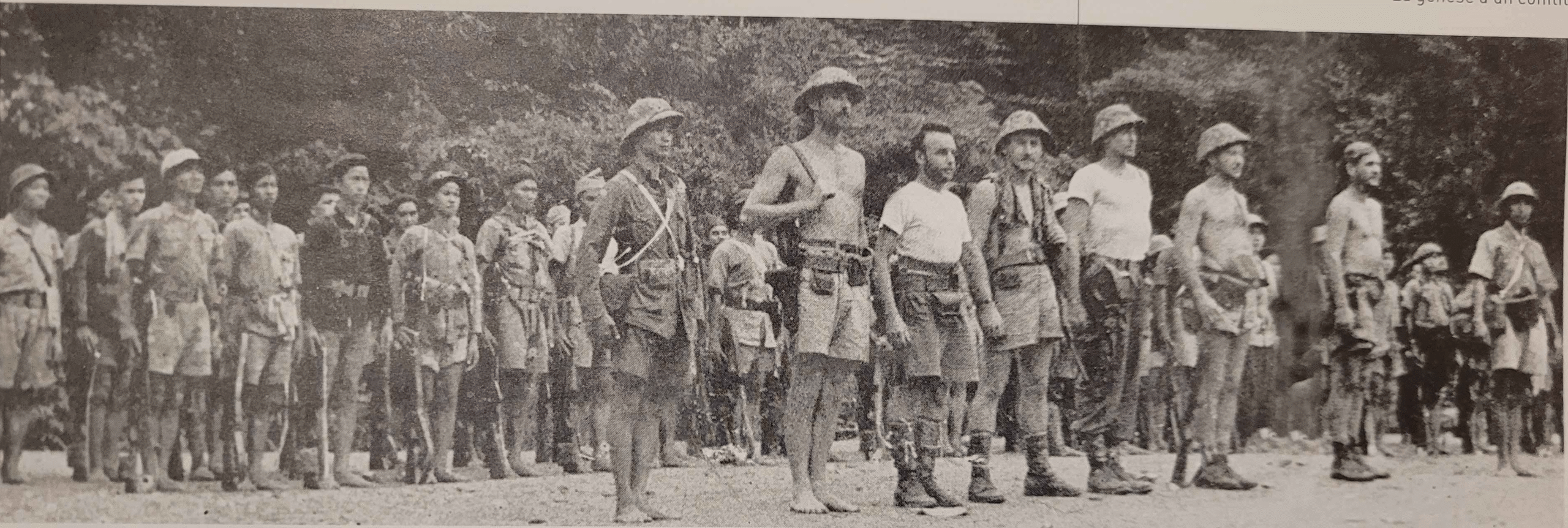 OSS Officers and Vietminh troops at the start of the brief offensive toward Hanoi at the start of the August Revolution, 1945 [3778x127x]
