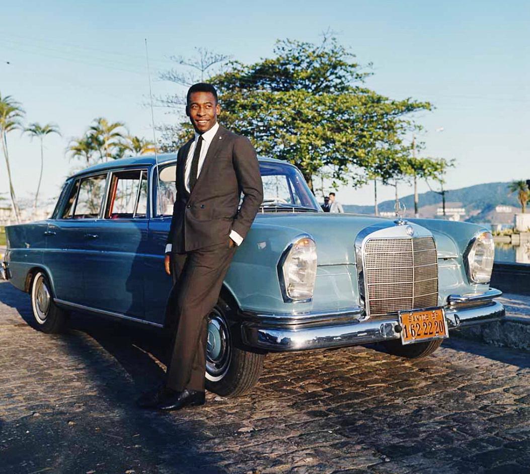 Brazilian footballer Pelé (1940 – 2022) the Santos and Brazil star posing with His Mercedes car; Photo: Popperfoto; Brazil – São Paulo, Santos, 1966 [1053×942]
