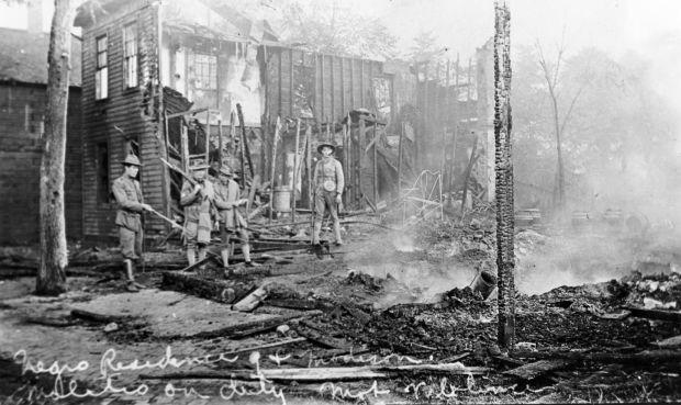 Illinois militiamen stand amid the ruins of Springfield’s Black neighborhood, the “Badlands,” after the 1908 Springfield Race Riot, in which white mobs killed at least 17 people[620X369].