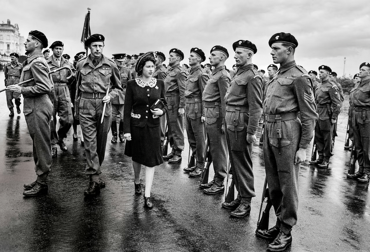18-year-old Princess Elizabeth, the future queen, inspects an honor guard of the Second Battalion Grenadier Guards on May 17, 1944, during D-Day preparations.[1200×817]