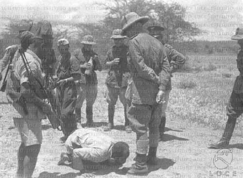 Ethiopian tribal chief submitting to Italian troops. Italo-Ethiopian war, 1935-36 [500×371]