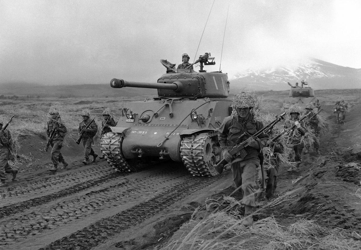 Soldiers with M1 Grand and BAR rifles – from the Japanese Ground Self-Defense Force (JGSDF) and with M4A3 Sherman medium tanks – at the Fuji Army School near Mount Fuji, c. 1957. [1200 x 834]