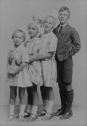 Roald Dahl (10) with his sisters Alfhild, Else and Asta. Carrdiff, Wales, United Kingdom. 1927 [291×420]