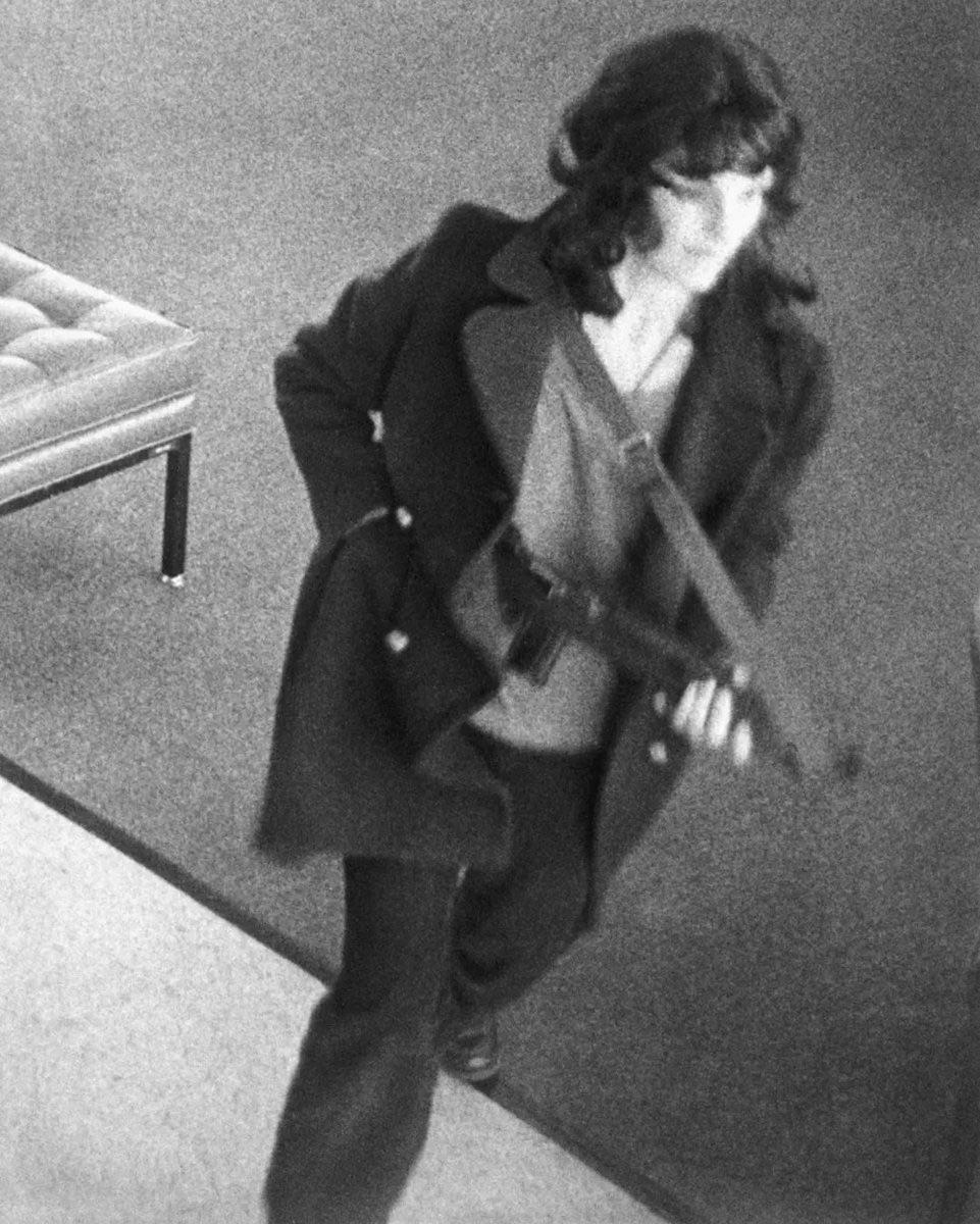 Security camera photograph of Patricia ‘Patty’ Hearst – during the robbery of the Hibernia Bank in San Francisco, California – on April 15th, 1974. [961 x 1200]
