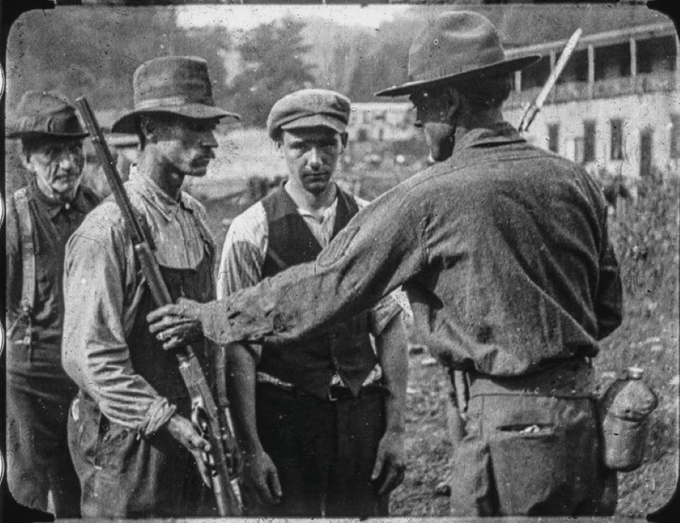 Striking miners surrender their rifles to federal troops after the Battle of Blair Mountain, 1921(960×738)