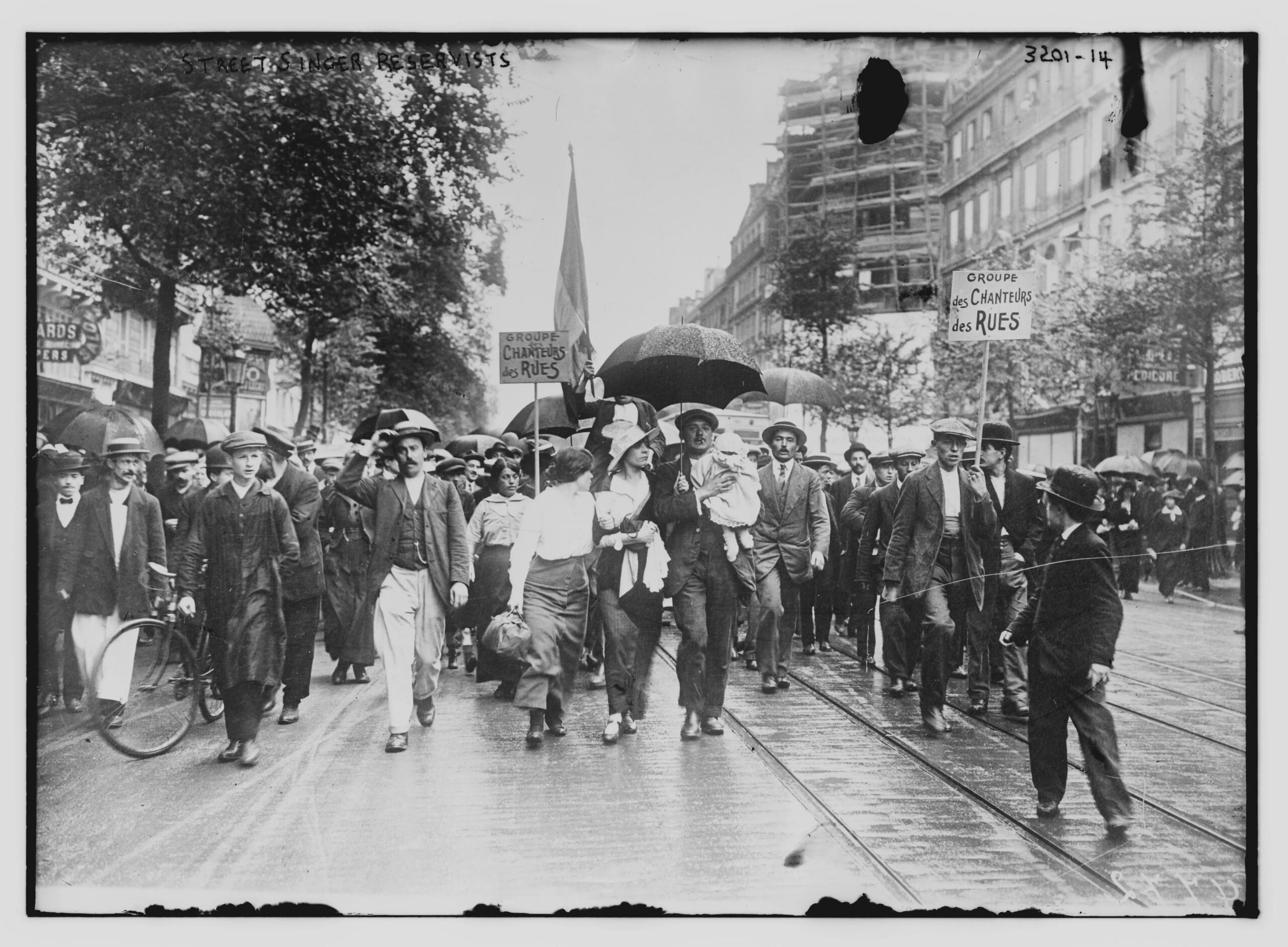 French reservist soldiers singing in the streets of Paris before heading to the front lines during WWI. (1914) [3401×2500]