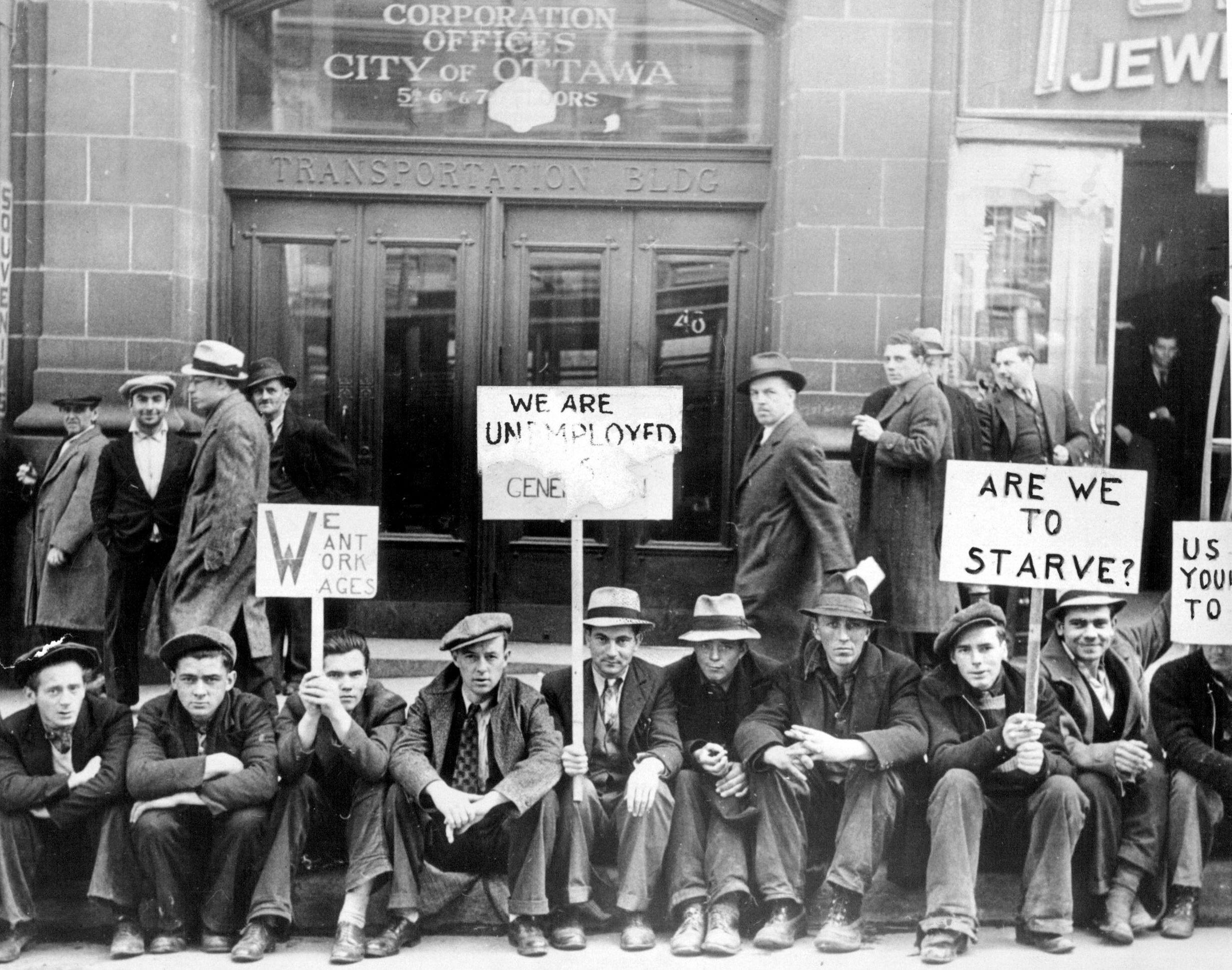 Unemployed men on strike in front of Ottawa’s civic offices to demand federal government relief during the Great Depression. (1939) [2463×1940]