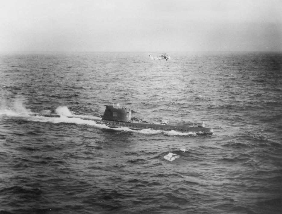 A US Navy HSS-1 Seabat helicopter hovers over Soviet submarine B-59, driven to the surface by US Naval forces in the Caribbean near Cuba, October 28 or 29, 1962.[936×711]