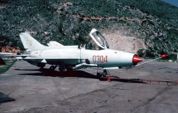 Chinese Chengdu F-7A ‘Fishcan’ fighter aircraft, from the Albanian Air Force, at the Gjadër Air Base – north of Lezhë, Albania, c. 1990s. [600 x 382]
