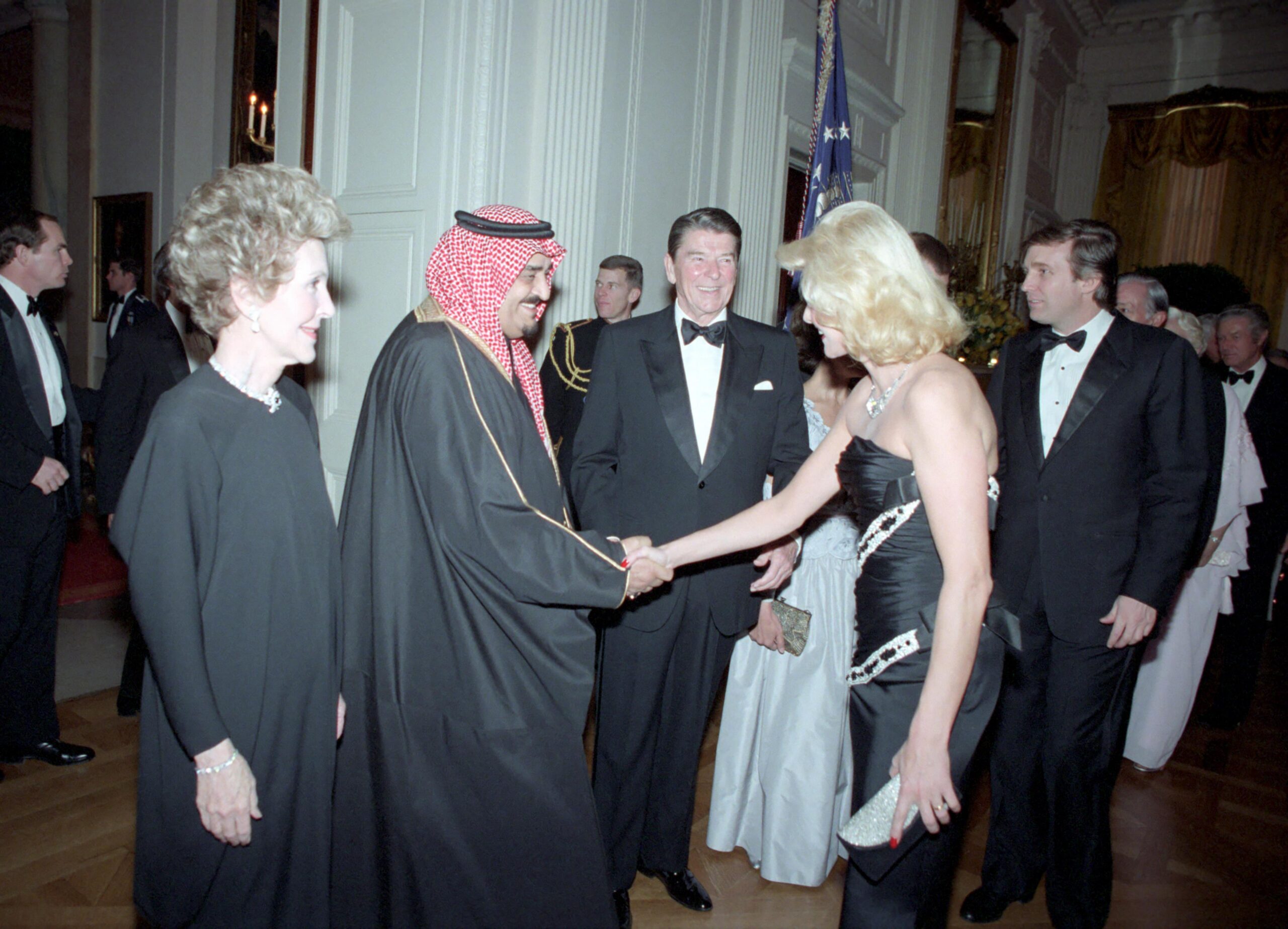 President Ronald Reagan, First Lady Nancy Reagan, Donald, and Ivana Trump at a White House state dinner for King Fahd bin Abdulaziz Al Saud of Saudi Arabia. 11 February 1985 [4000 × 2885]