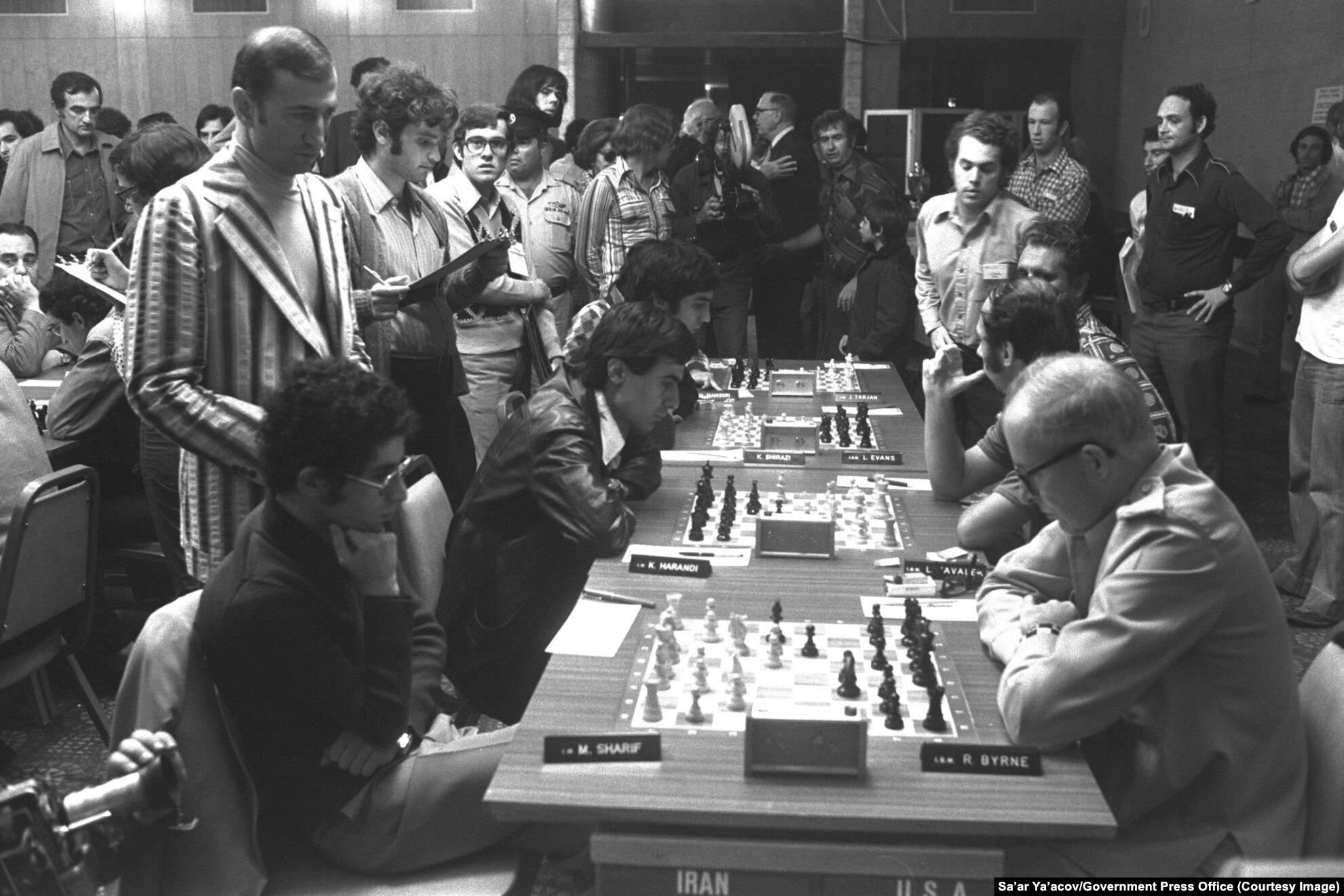 Iranian and US chess teams competing against each other at the World Chess Olympiad in Israel, 1976. [1980×1320]