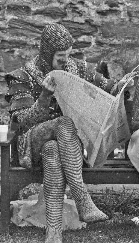 John Cleese taking a break on the set of Monty Python and the Holy Grail (1975) [468×810]