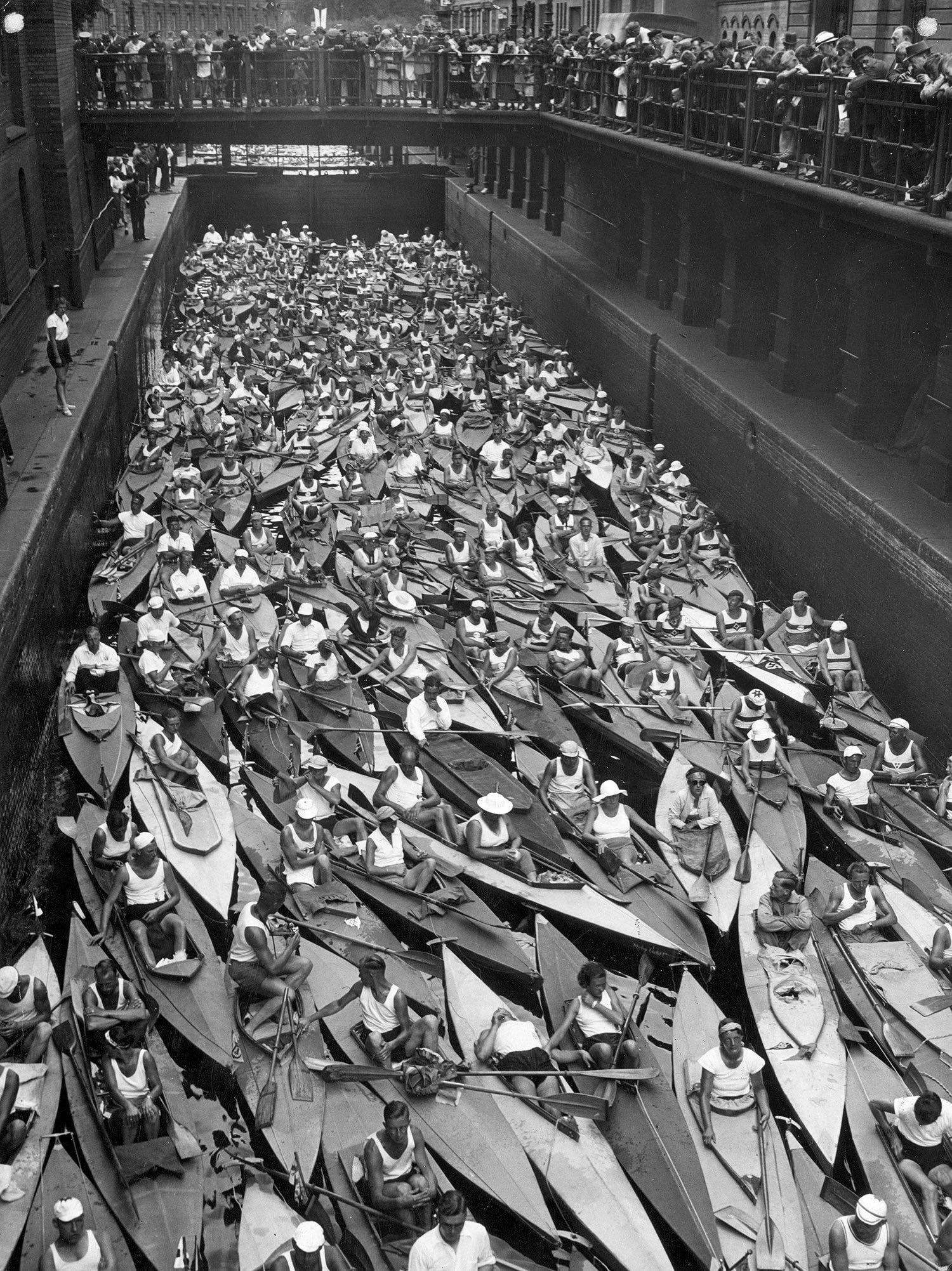 More than 600 kayaks got stuck in a lock on the River Spree in Berlin on their way to a canoeing event on a nearby lake. Photo: Fox Photos Agency. Germany – Berlin, 1936 [1500×2003]