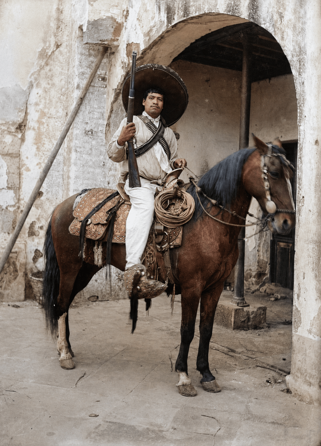 A revolutionary soldier on horseback during the Mexican Revolution, 1910s [Colorized] [1064 × 1478]