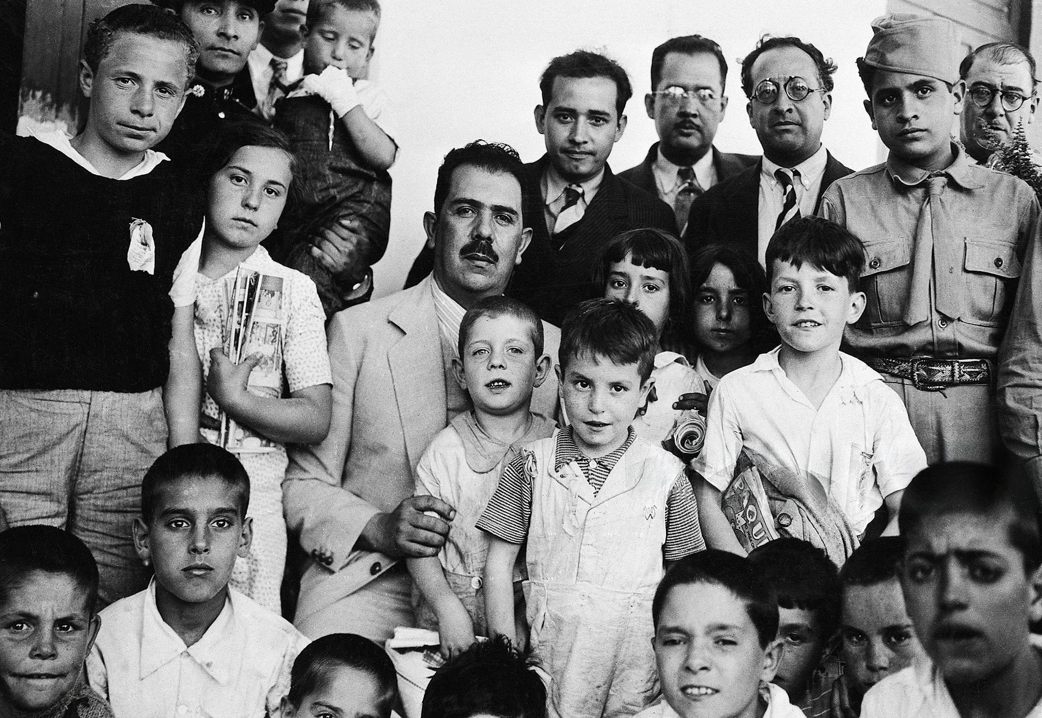 Mexican revolutionary general & President Lazaro Cardenas with Spanish civil war orphans, 1930s. A radical left-wing populist, he ended the tyrannical reign of President Calles & wrested Mexico’s oil reserves from US control. He was the most popular Mexican president of the 20th century (2480×1411)
